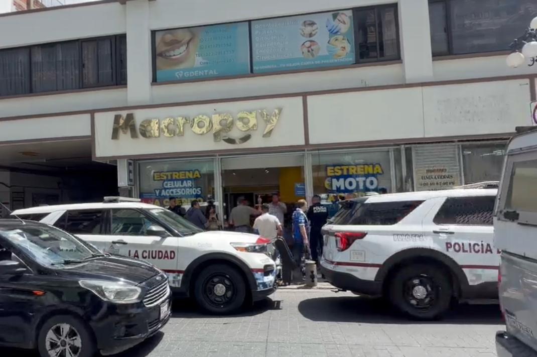 Policía Auxiliar, suicidio, Macropay, Centro Histórico, FGE, diligencias